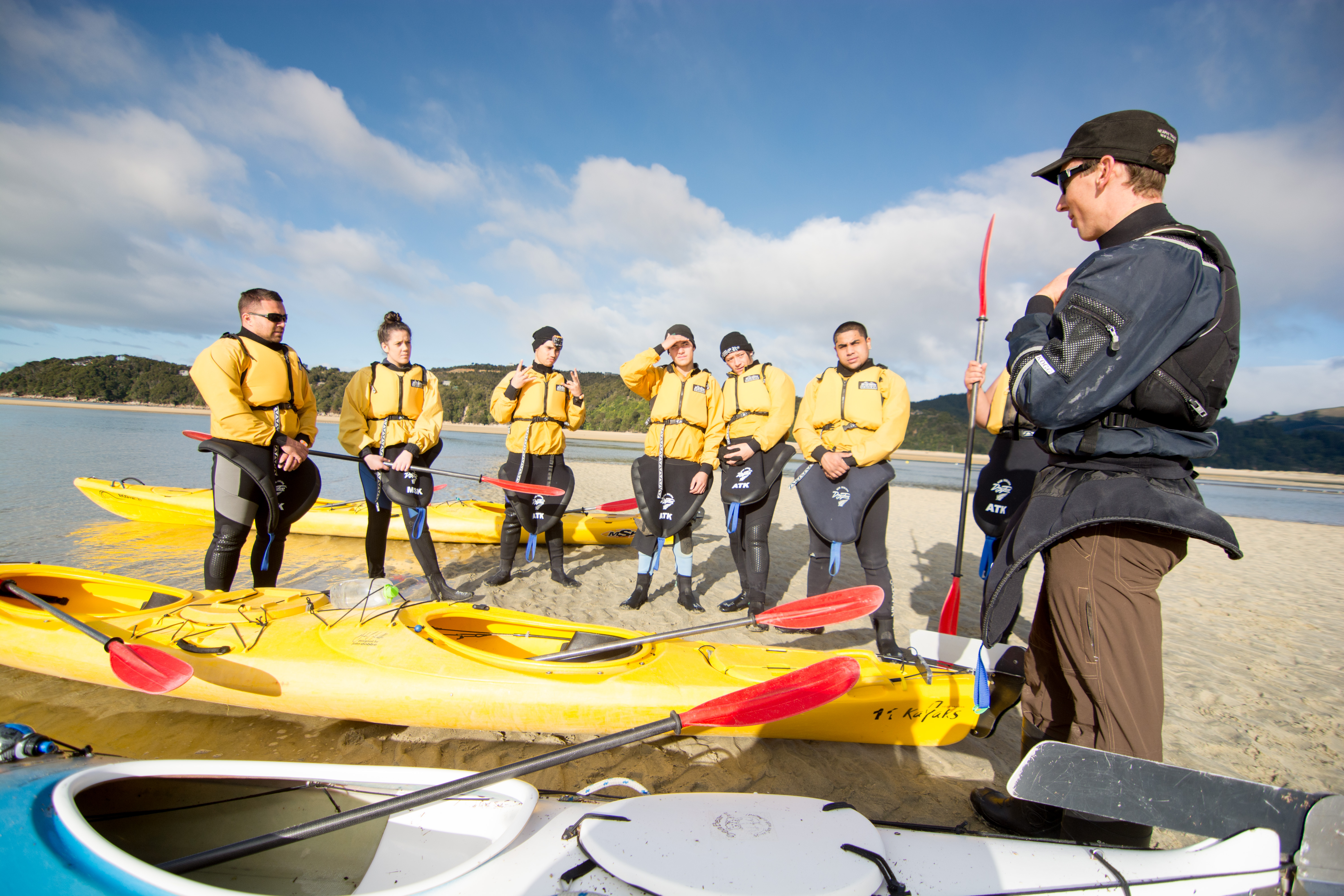 Students preparing for a sea kayak trip. 